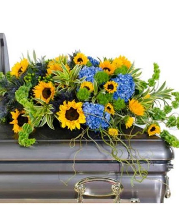 Sunshine & Skies Casket Spray