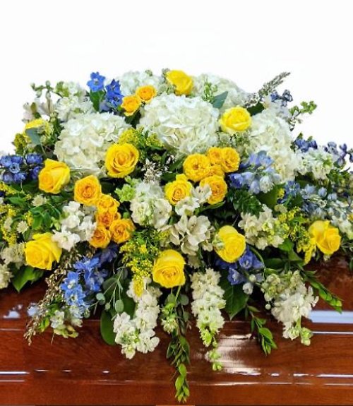 Blue Yellow And White Casket Spray